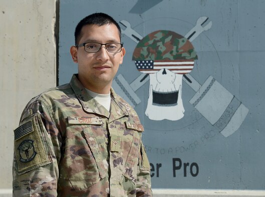 Airman Rene Cruz, 455th Expeditionary Civil Engineer Squadron power production engineer, poses for a photo Mar. 6, 2018 at Bagram Airfield, Afghanistan.