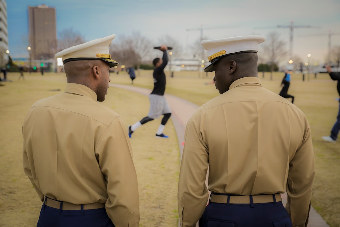 Marines oversee student athletes of the 2018 Mid-Eastern Athletic Conference participating in a morning workout honoring Cpl Jason Dunham at Town Point Park in Norfolk, Virginia, March 10. The workout was chosen to teach the participants about their character and fighting spirit. Dunham was posthumously awarded the Medal of Honor for his actions while serving with 3rd Battalion, 7th Marines during the Iraq War.