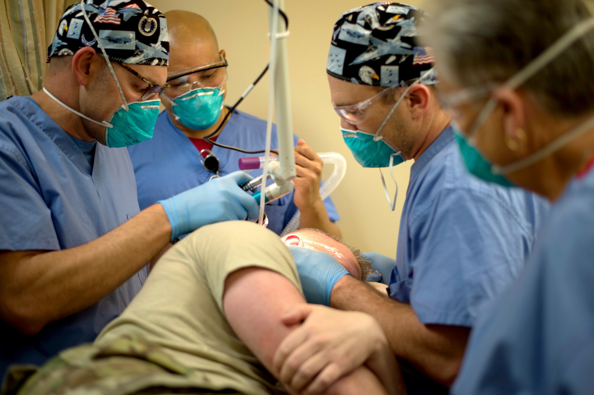 An Active duty dermatology patient receives laser treatment for scarring on his neck at MacDill Air Force Base, Fla., March 9, 2018.