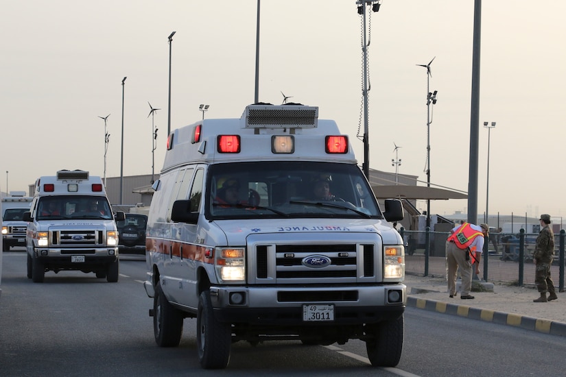 Camp Arifjan emergency medical workers move their ambulances to the casualty collection point during a simulated active shooter and mass casualty exercise, Camp Arifjan, Kuwait, March 8, 2018. The exercise tested first responders and other emergency services that would be crucial during a real-world emergency.