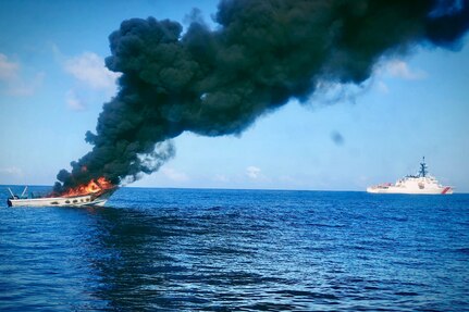 USCGC Hamilton destroys a suspected smuggling vessel as a hazard to navigation following a Feb. 2018 interdiction operation.