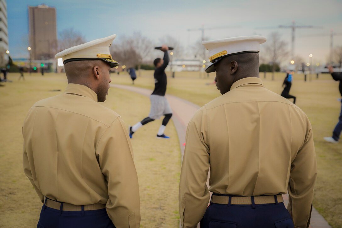 Marines oversee student athletes of the 2018 Mid-Eastern Athletic Conference participating in a morning workout honoring Cpl Jason Dunham at Town Point Park in Norfolk, Virginia, March 10. The workout was chosen to teach the participants about their character and fighting spirit. Dunham was posthumously awarded the Medal of Honor for his actions while serving with 3rd Battalion, 7th Marines during the Iraq War. (U.S. Marine Corps photo by Cpl. Michael McHale)