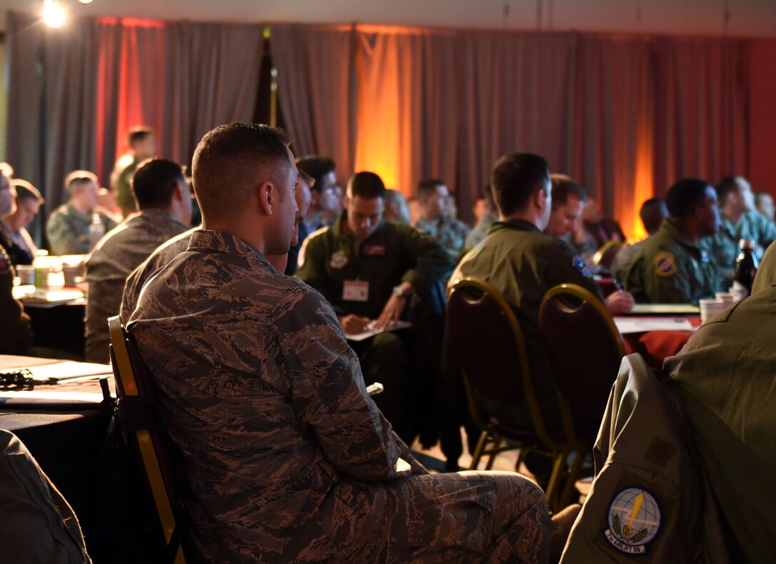 Attendees of the Spark Innovation Summit at Travis Air Force Base, Calif., wait during a pause between briefings March 6, 2018. Among those who attended the summit were members of senior leadership from every MAJCOM in the Air Force. (U.S. Air Force photo by Airman 1st Class Christian Conrad)
