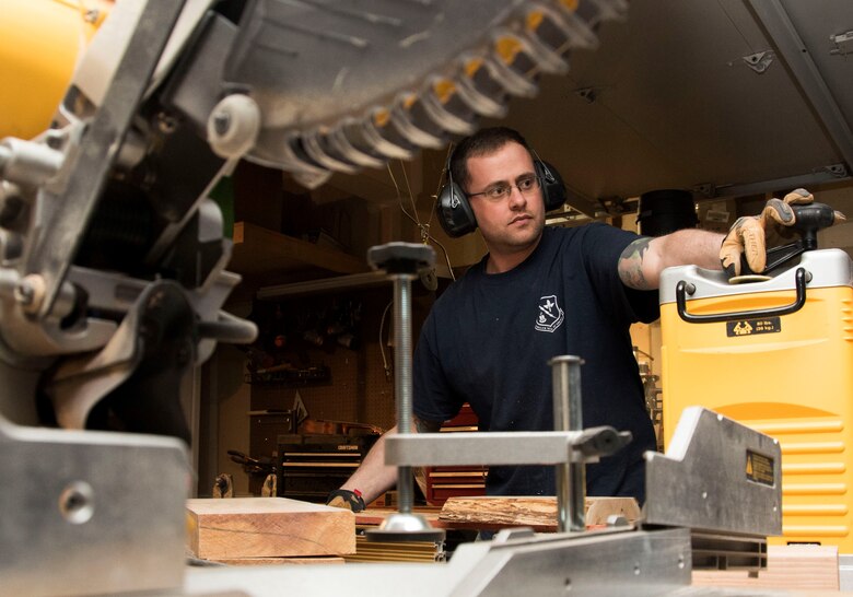 Airman shapes hearts, minds with sawdust