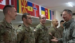 Maj. Gen. Anthony German, New York's adjutant general, spoke with officers and non-commissioned officers of the Simulations Center assigned to the Joint Multinational Training Group-Ukraine on March 8, 2018, in Yavoriv.