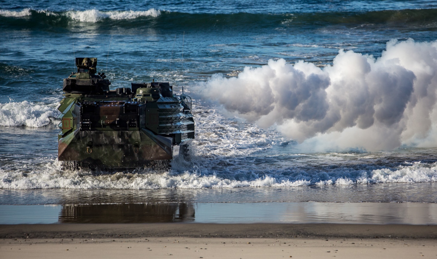 An Amphibious Assault Vehicle with 3rd Assault Amphibian Battalion, 1st Marine Division, lands on Marine Corps Base Camp Pendleton as part of exercise Iron Fist 2018 on Feb. 5.