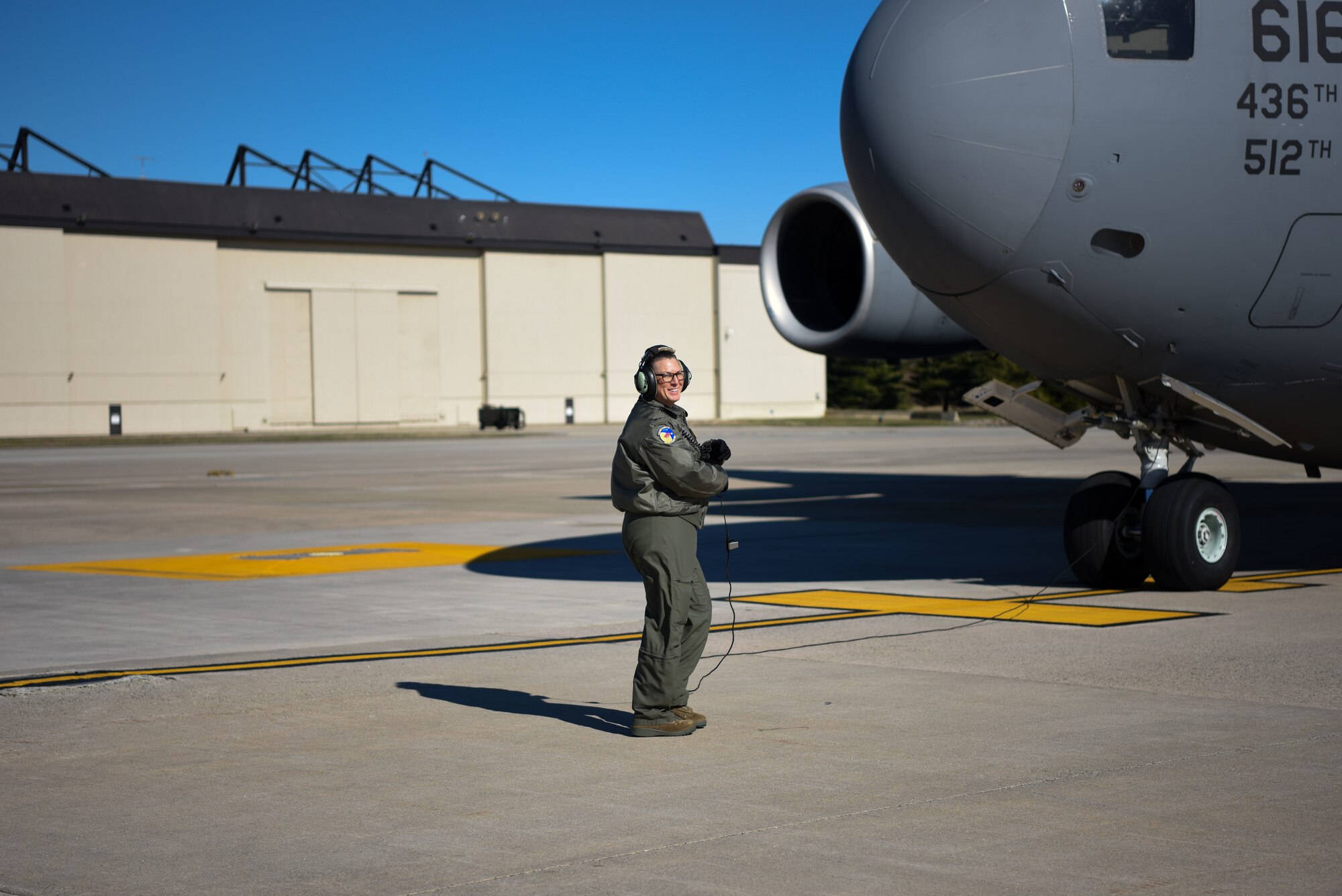 Senior Master Sgt. Lori Tascione, 3rd Airlift Squadron superintendent, scans for engine start March 5, 2018, at Dover Air Force Base, Del. Tascione joined an all-female crew to fly the final flight of her career. (U.S. Air Force Photo by Airman 1st Class Zoe M. Wockenfuss)