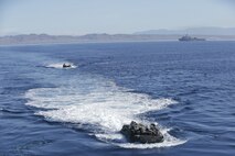 Marines with 3rd Assault Amphibian Battalion, 1st Marine Division, and Japanese Soldiers with the Western Army Infantry Regiment, Japan Ground Self Defense Force, launch from Marine Corps Base Camp Pendleton’s Red Beach training area drive to and board the USS Rushmore (LSD-47) in Amphibious Assault Vehicles during exercise Iron Fist 2018, Jan. 31