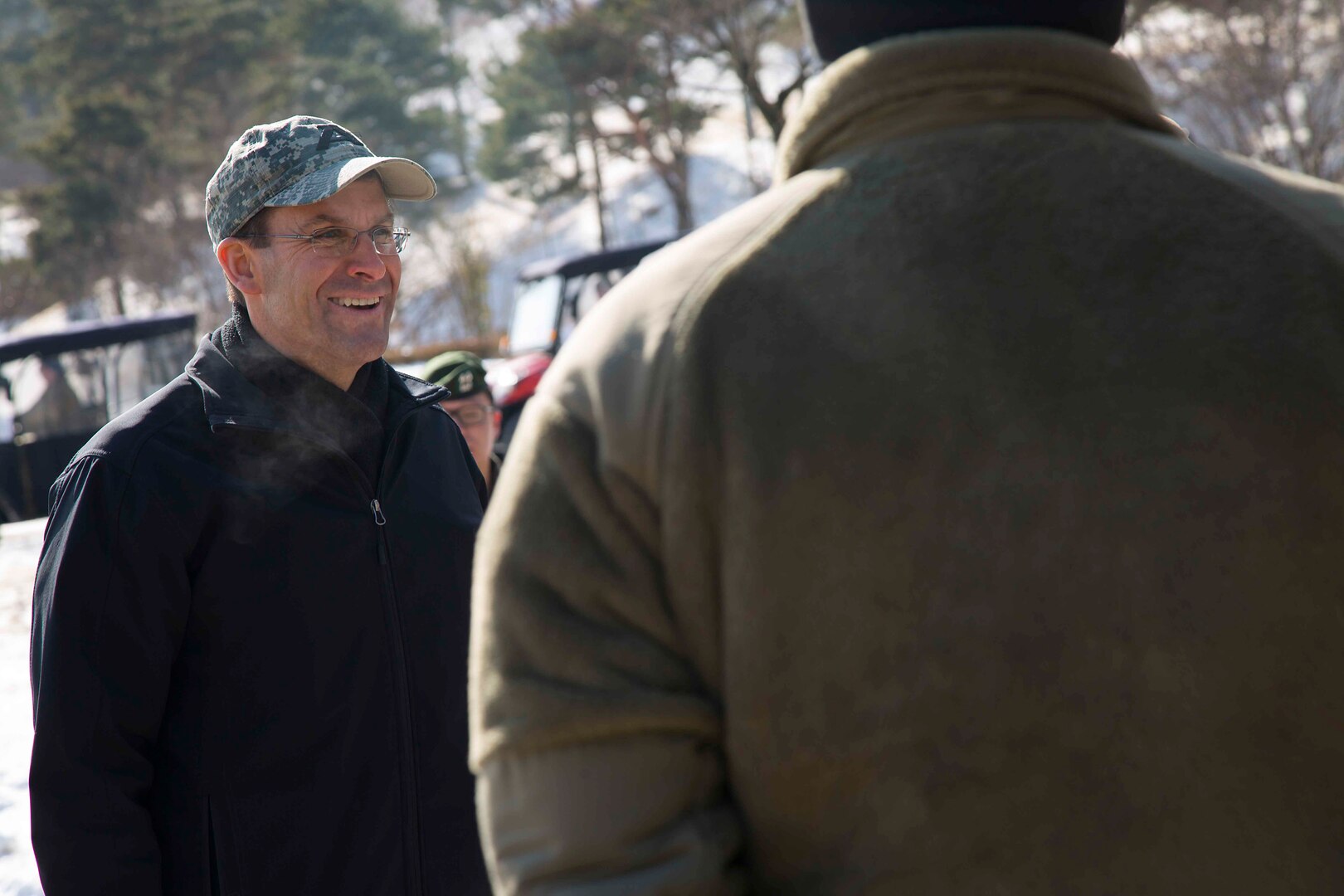 Secretary of the Army Mark T. Esper (left)  talks with Soldiers from Combined Task Force Defender, 35th Air Defense Artillery Brigade, at Seongju, South Korea on Jan. 10, 2018. Esper visited Korea to discuss readiness with units throughout the Korean theater and to inform Soldiers, Families and Civilians on his position and policies as the Secretary of The Army during his three-day visit.