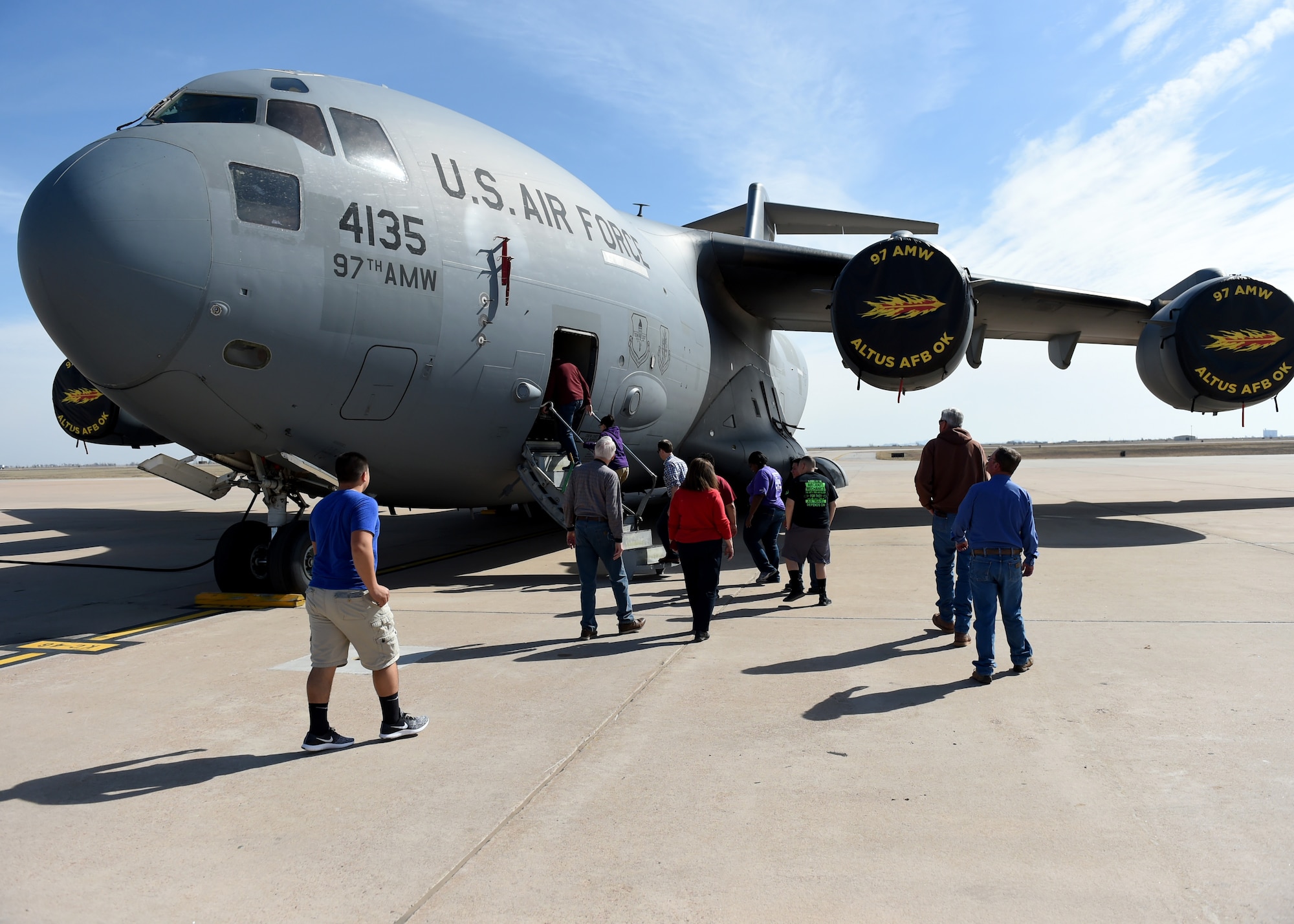 Civilian and training pilots tour a static display of a C-17 Globemaster III, March 10, 2018, at Altus Air Force Base, Okla.