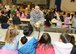Master Sgt. Christina Harper, 412th Aerospace Medicine Squadron Dental Flight chief, shows Branch Elementary School students an egg submerged in soda to demonstrate how sugar can break down tooth enamel if not properly cleaned. February is National Children’s Dental Health Month. (U.S. Air Force photo by Kenji Thuloweit)