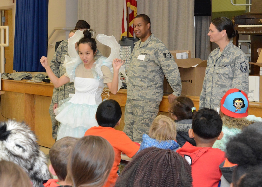 The Oral Hygiene Fairy, played by Capt. Josephine Nguyen, 412th Aerospace Medicine Squadron general dentist, gives dental tips to students at Branch Elementary March 1. Members of the 412th Medical Group dropped by the school as part of their recognition of National Children’s Dental Health Month. (U.S. Air Force photo by Kenji Thuloweit)