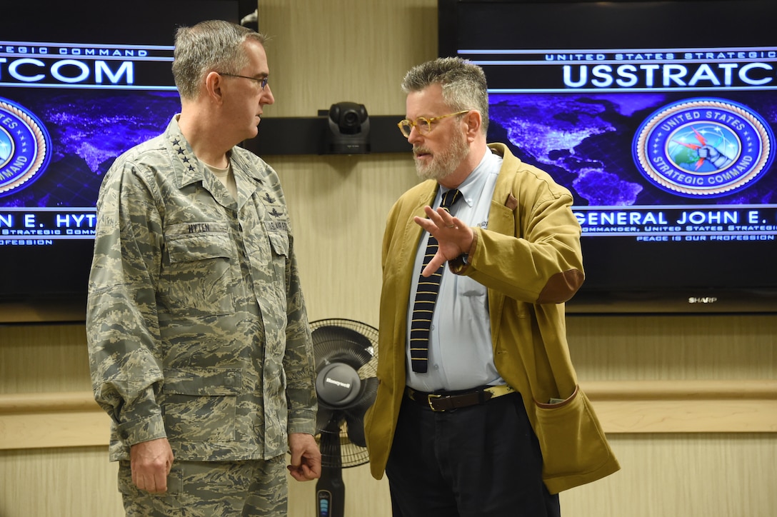 Gen. John Hyten, commander of U.S. Strategic Command (USSTRATCOM), speaks to Dr. Michael Desch, director of Notre Dame International Security Center (NDISC), at Offutt Air Force Base, Neb., March 13, 2018.