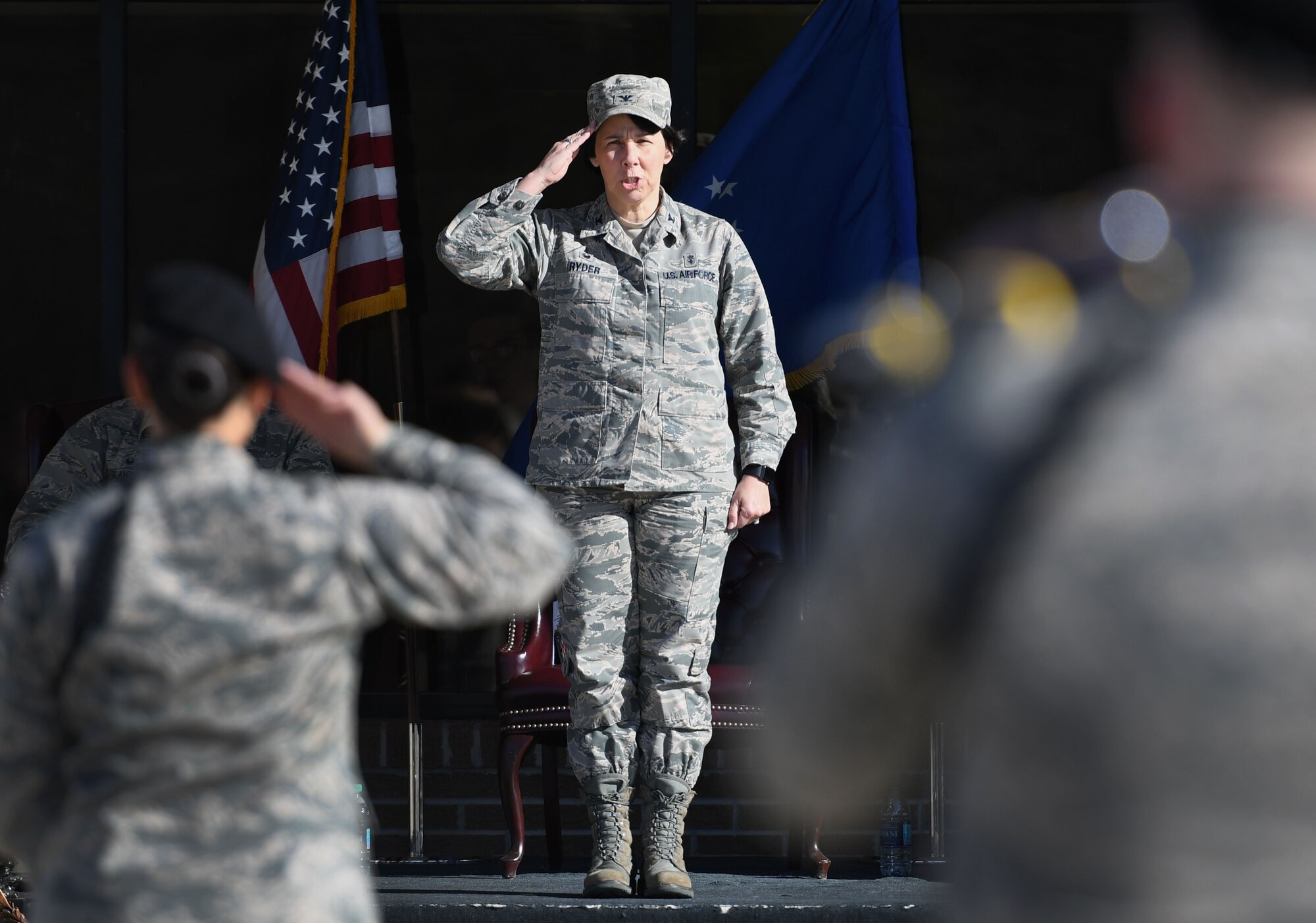 U.S. Air Force Col. Jeannine Ryder, 81st Medical Group commander, grants permission for the 338th Training Squadron freestyle drill team to enter the field of freestyle drill competition during the 81st Training Group drill down on the Levitow Training Support Facility drill pad March 9, 2018, on Keesler Air Force Base, Mississippi. Airmen from the 81st TRG competed in a quarterly open ranks inspection, regulation drill routine and freestyle drill routine. The 335th TRS “Bulls” took first place this quarter. (U.S. Air Force photo by Kemberly Groue)