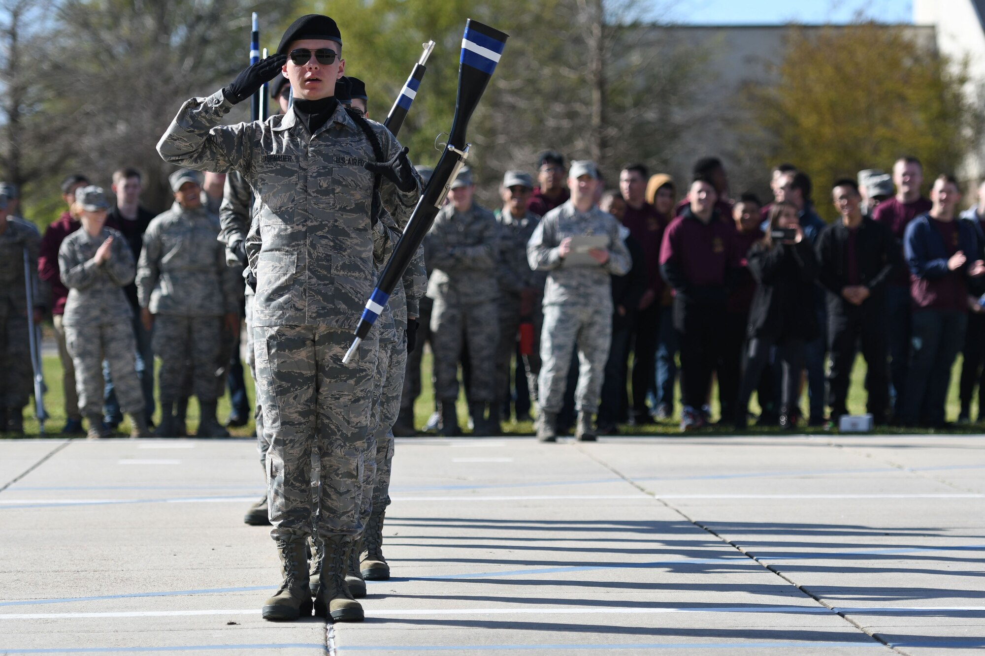 U.S. Air Force Airman 1st Class Joseph Hasenauer, 334th Training Squadron freestyle drill team drill master, requests permission to exit the field of freestyle drill competition during the 81st Training Group drill down on the Levitow Training Support Facility drill pad March 9, 2018, on Keesler Air Force Base, Mississippi. Airmen from the 81st TRG competed in a quarterly open ranks inspection, regulation drill routine and freestyle drill routine. The 335th TRS “Bulls” took first place this quarter. (U.S. Air Force photo by Kemberly Groue)