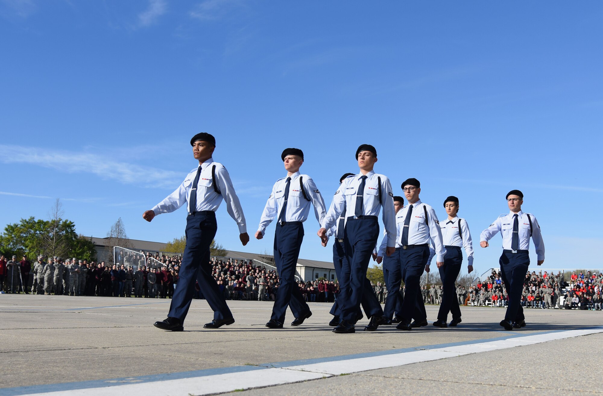 Members of the 338th Training Squadron regulation drill team perform during the 81st Training Group drill down on the Levitow Training Support Facility drill pad March 9, 2018, on Keesler Air Force Base, Mississippi. Airmen from the 81st TRG competed in a quarterly open ranks inspection, regulation drill routine and freestyle drill routine. The 335th TRS “Bulls” took first place this quarter. (U.S. Air Force photo by Kemberly Groue)