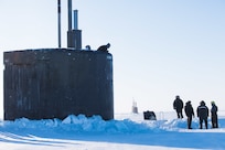 Ice Camp Skate (March 9, 2018) – Los Angeles-class fast-attack submarine USS Hartford SSN 768 surfaces through the ice March 9, 2018 in support of Ice Exercise (ICEX) 2018. ICEX 2018 is a five-week exercise that allows the Navy to assess its operational readiness in the Arctic, increase experience in the region, advance understanding of the Arctic environment, and continue to develop relationships with other services, allies and partner organizations. (U.S. Navy photo by Mass Communication 2nd Class Micheal H. Lee)