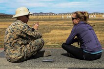 Recruiting Station St. Louis educators congratulate each other after completing a problem-solving event at Marine Corps Base Camp Pendleton, Calif., during the Recruiting Station St. Louis Educators Workshop, March 5-9. The purpose of the workshop is to identify and provide selected educators and other community influencers the opportunity to gain first-hand experience on how the Marine Corps transforms young men and women into U.S. Marines. This workshop provides current information regarding  Marine Corps recruit training practices and procedures, military job skills and opportunities, military lifestyle, and educational benefits available to Marines. The intent of the program is to demystify the recruit training experience and foster closer relationships between recruiting station personnel and those in their communities who have influence on the decisions of young men and women.