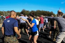 Educators participate during a Marine Corps Martial Arts Program event at Marine Corps Recruit Depot San Diego, Calif., during the Recruiting Station St. Louis Educators Workshop, March 5-9. The purpose of the workshop is to identify and provide selected educators and other community influencers the opportunity to gain first-hand experience on how the Marine Corps transforms young men and women into U.S. Marines. This workshop provides current information regarding  Marine Corps recruit training practices and procedures, military job skills and opportunities, military lifestyle, and educational benefits available to Marines. The intent of the program is to demystify the recruit training experience and foster closer relationships between recruiting station personnel and those in their communities who have influence on the decisions of young men and women.