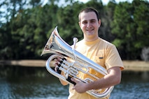David Alan Beresoff Jr. shows off the euphonium, which is the instrument he will play as a musician in the Marine Corps, February 16, 2018.  His Marine Corps recruiters from Recruiting Substation Wilmington, North Carolina, are mentally and physically preparing him and other applicants for the challenges of Marine Corps Recruit Training. He practices playing the euphonium 3 hours every day to prepare himself for the Marine Corps Band.  (U.S. Marine Corps Photo by Sgt Antonio J. Rubio/Released)