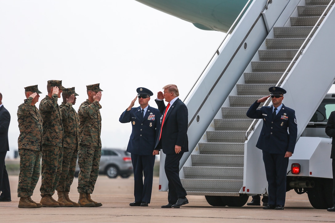 President of the United States Donald J. Trump salutes military leaders after landing at Marine Corps Air Station Miramar, Calif., March 13, 2018. President Trump visited MCAS Miramar to speak with service members and their families. (U.S. Marine Corps photo by Cpl. Becky Calhoun/Released)