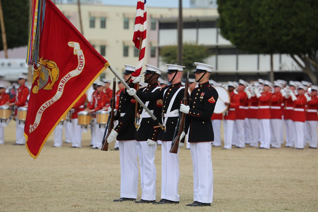 The U.S. Marine Corps Color Guard presents the U.S. Marine Corps Battle Colors during their first West Coast tour performance at Marine Corps Air Station Yuma, Yuma, Az., March 7, 2018. The performance was concluded with a meet and greet and the hosting official, Col. David A. Suggs, commanding officer, MCAS Yuma, spoke with the Marines of the Battle Color Detachment before their departure from Yuma and onto their West Coast Tour. (Official Marine Corps photo by Cpl. Damon Mclean/Released)