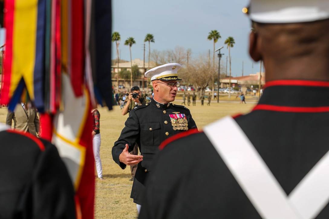 Colonel David A. Suggs, commanding officer, Marine Corps Air Station (MCAS) Yuma, spoke to the Marines of the Battle Color Detachment after their first West Coast tour performance at MCAS Yuma, Yuma, Az., March 7, 2018. The BCD consists of the Silent Drill Platoon, “The Commandant’s Own,” the United States Marine Drum & Bugle Corps and the Marine Corps Color Guard.(Official Marine Corps photo by Cpl. Damon Mclean/Released)