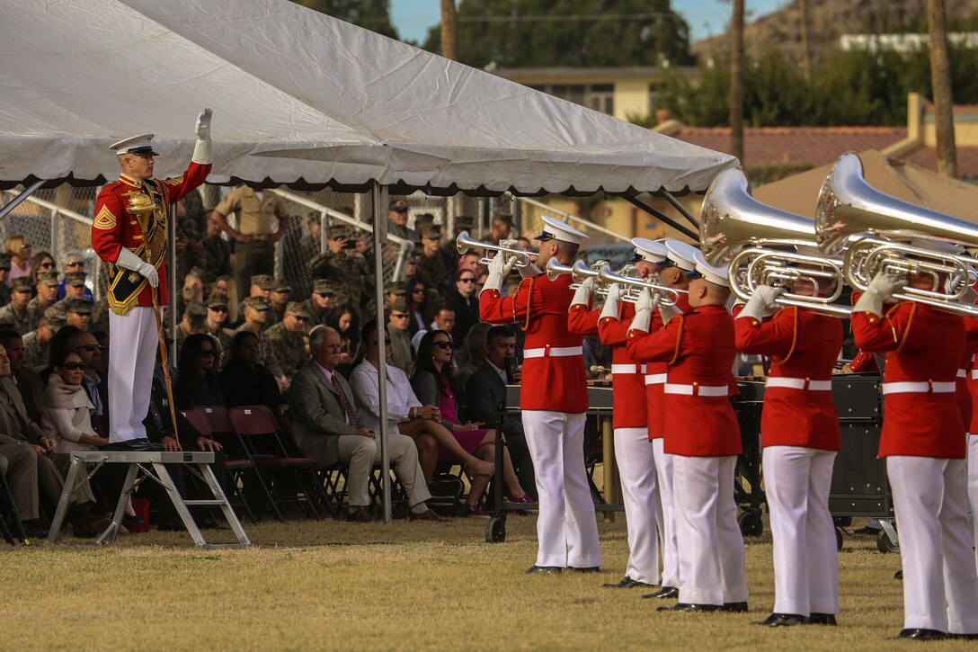 Master Sgt. Keith Martinez, drum major, “The Commandant’s Own,” U.S. Marine Drum & Bugle Corps, conducts the D&B during the first West Coast tour performance at Marine Corps Air Station Yuma, Yuma, Az., March 7, 2018. Col. David A. Suggs, commanding officer, MCAS Yuma, was the hosting official and spoke to the Marines of the BCD after the performance.