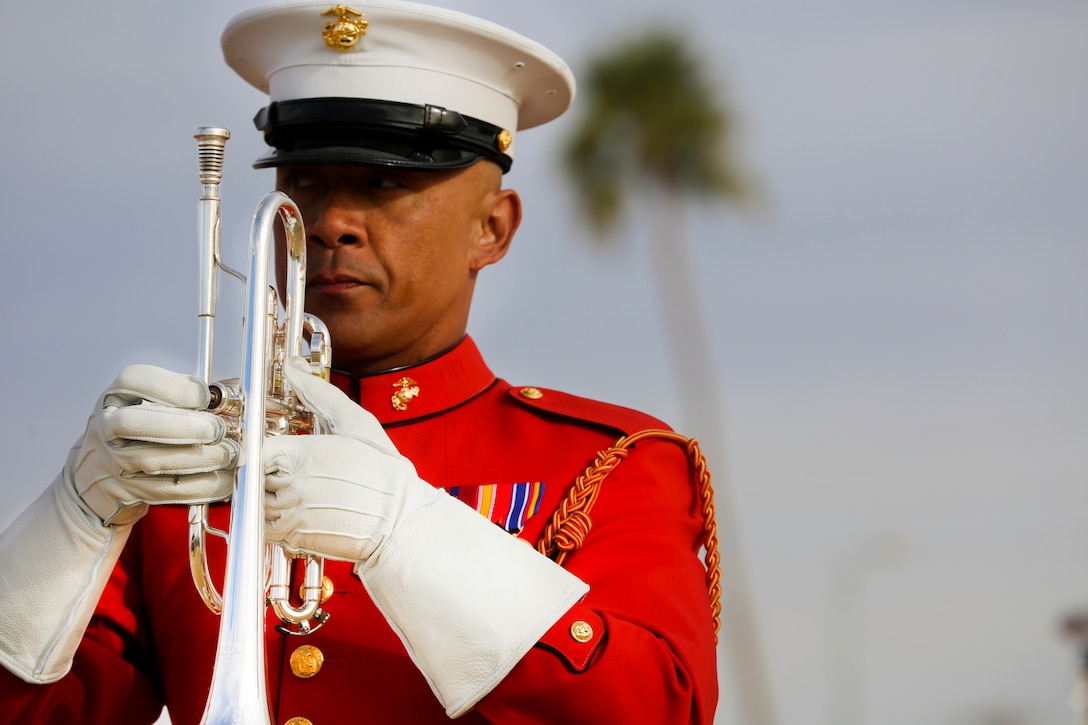Master Sgt. Randy Rivera, bugler, “The Commandant’s Own,” U.S. Marine Drum & Bugle Corps, performs alongside D&B Marines during the first West Coast tour performance at Marine Corps Air Station Yuma, Yuma, Az., March 7, 2018. Col. David A. Suggs, commanding officer, MCAS Yuma, was the hosting official and spoke to the Marines of the BCD after the performance.
