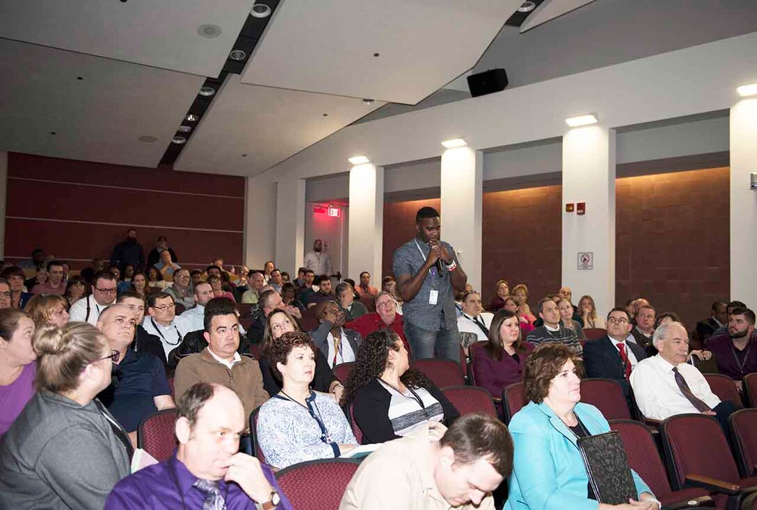 Christan Middleton asks a question during the question and answer session following Bunn’s presentation at DSCC