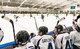 Dover Eagles players Kyle Gaylord (4) and Mike Hebert (40) wait their turn to get in the game against the Dover Fraternal Order of Police Lodge 15 hockey team play during a charity game March 10, 2018, at the Centre Ice Rink in Harrington, Del. The Eagles won the game 8-4. (U.S. Air Force photo by Roland Balik)