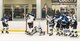 Dover Eagles goaltender Matthew McKenzie (87) blocks a shot by a Dover Fraternal Order of Police Lodge 15 player near the end of the second period during a charity game March 10, 2018, at the Centre Ice Rink in Harrington, Del. The Eagles scored two goals within the first couple of minutes and went on to win the game 8-4. (U.S. Air Force photo by Roland Balik)