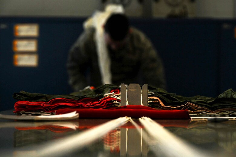 A parachute harness sits on a review table at the 20th Operations Support Squadron aircrew flight equipment (AFE) back shop at Shaw Air Force Base, S.C., March 5, 2018.