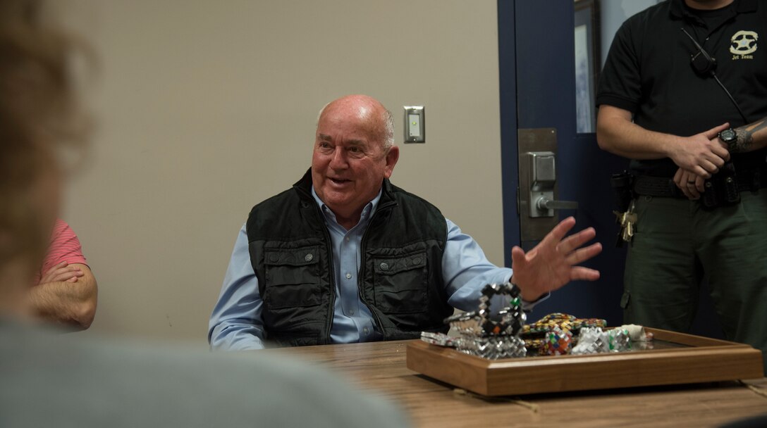 Lester Paulk, Lowndes County Sheriff, displays examples of confiscated contraband from the jail to the students of Leadership Moody, March 9, 2018, in Valdosta Ga. Leadership Moody strives to diversify and grow the skill sets of its students by integrating them with civic leaders in the community to discuss leadership, lessons learned and best practices. 
(U.S. Air Force photo by 1st Lt. Kaitlin G. Toner)