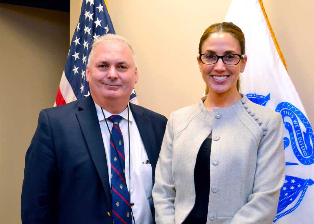 William Kenny, DLA Troop Support executive director of contracting and acquisition management, stands with Lauren Colabelli, a team chief with the Construction and Equipment supply chain. Colabelli was a member of a task force to bring generators to provide temporary electric power to Texas, Florida, Puerto Rico and the Virgin Islands in the wake of the string devastating hurricanes that swept through earlier in 2017.