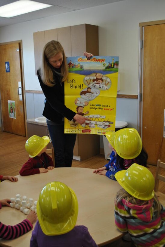 IWR staff member Kelly Barnes organized an educational outreach activity which introduced preschool children to basic engineering concepts through the American Society of Civil Engineers’ Curious George Bridge Build, combining engineering and the popular children’s cartoon character.