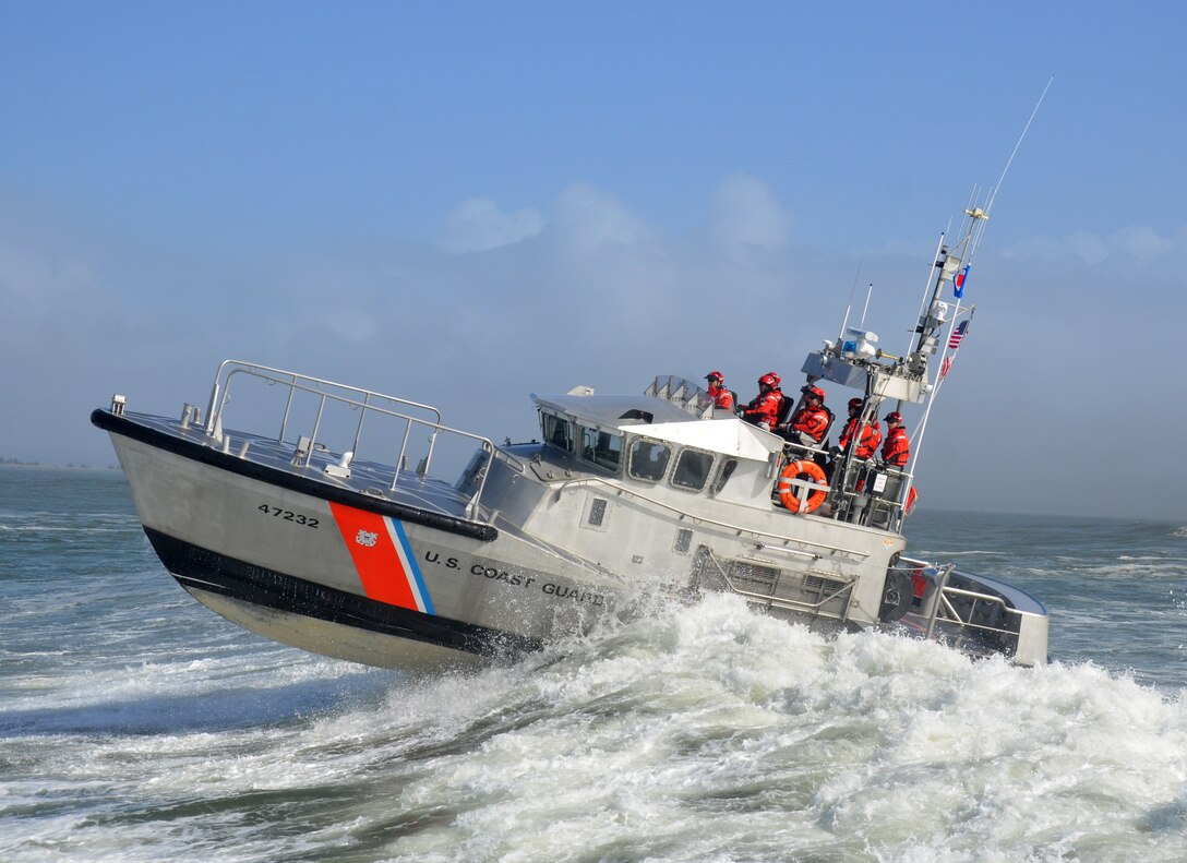 Instructors and students aboard a 47’ Motor Lifeboat practice boat-handling skills in surf conditions at the “Graveyard of the Pacific,” March 14, 2014.