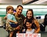 U.S. Air Force Tech. Sgt. Michael Vallejo, an explosive ordnance disposal team leader from the 509th Civil Engineer Squadron, poses with his wife Laura, and his children Brayden and Mylie after returning from a deployment.