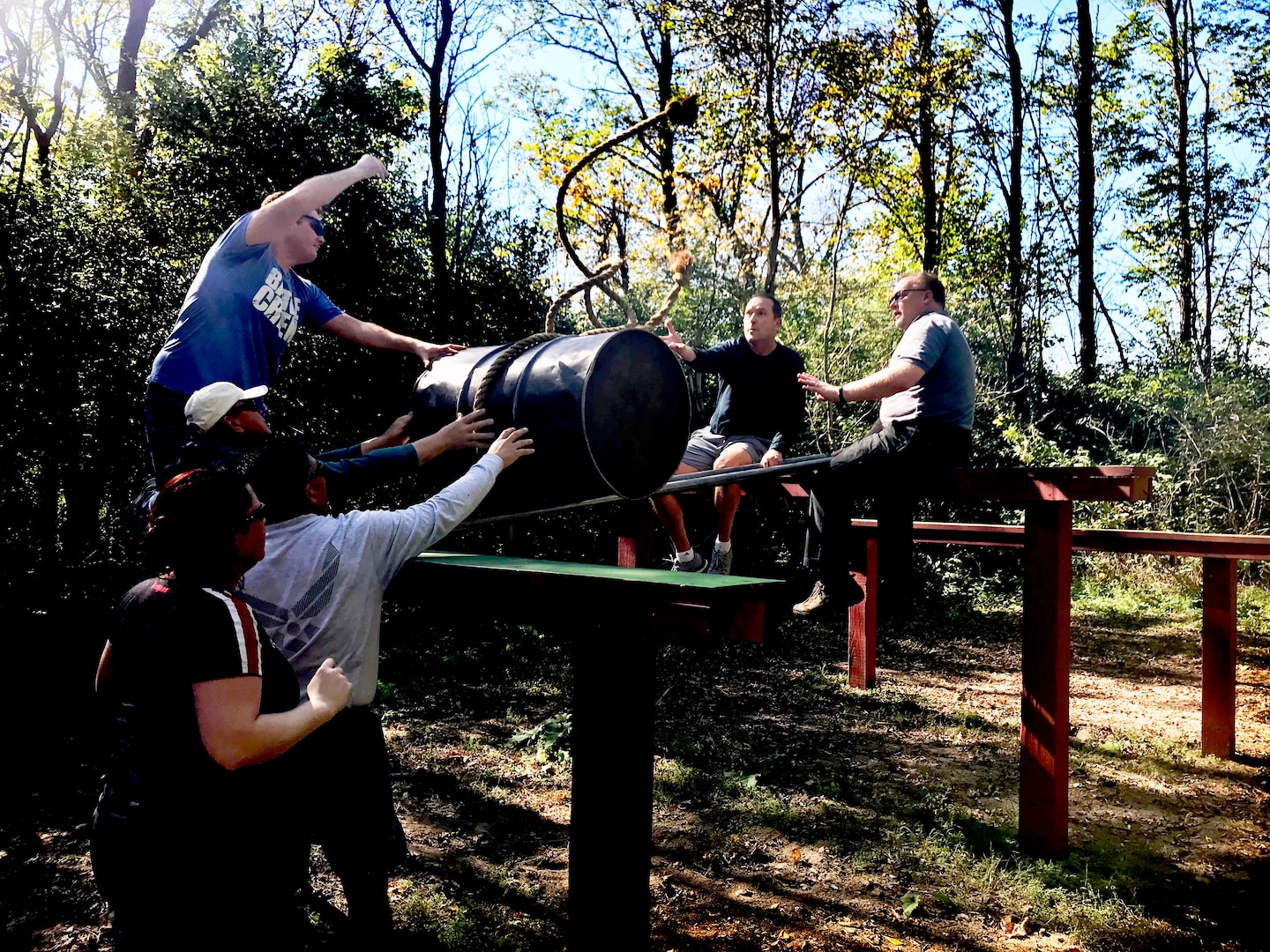 Members of DLA’s rapid deployment Red Team go through team-building exercises to foster trust and communication skills on an obstacle course during mobilization training at Camp Atterbury, Indiana.