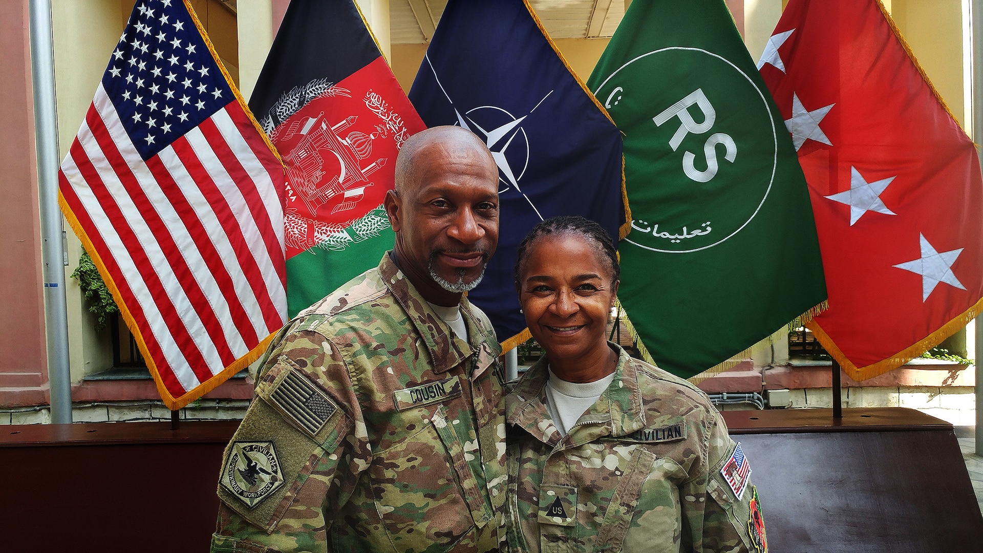 Darryl and Sandra Cousin from DLA Aviation pose for a photo while deployed to Afghanistan as part of the Civilian Expeditionary Workforce, a pool of DoD civilians who volunteer to deploy anywhere in the world for six months.