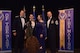 Tech. Sgt. Michael Vallejo, a 509th Civil Engineer Squadron explosive ordnance disposal team leader, receives a personalized flight suit from Brig. Gen. John Nichols, the 509th Bomb Wing commander, and Chief Master Sgt. James Lyda, the 509th BW command chief, during the 2017 Annual Awards Banquet at Whiteman Air Force Base, Mo., March 2, 2018.