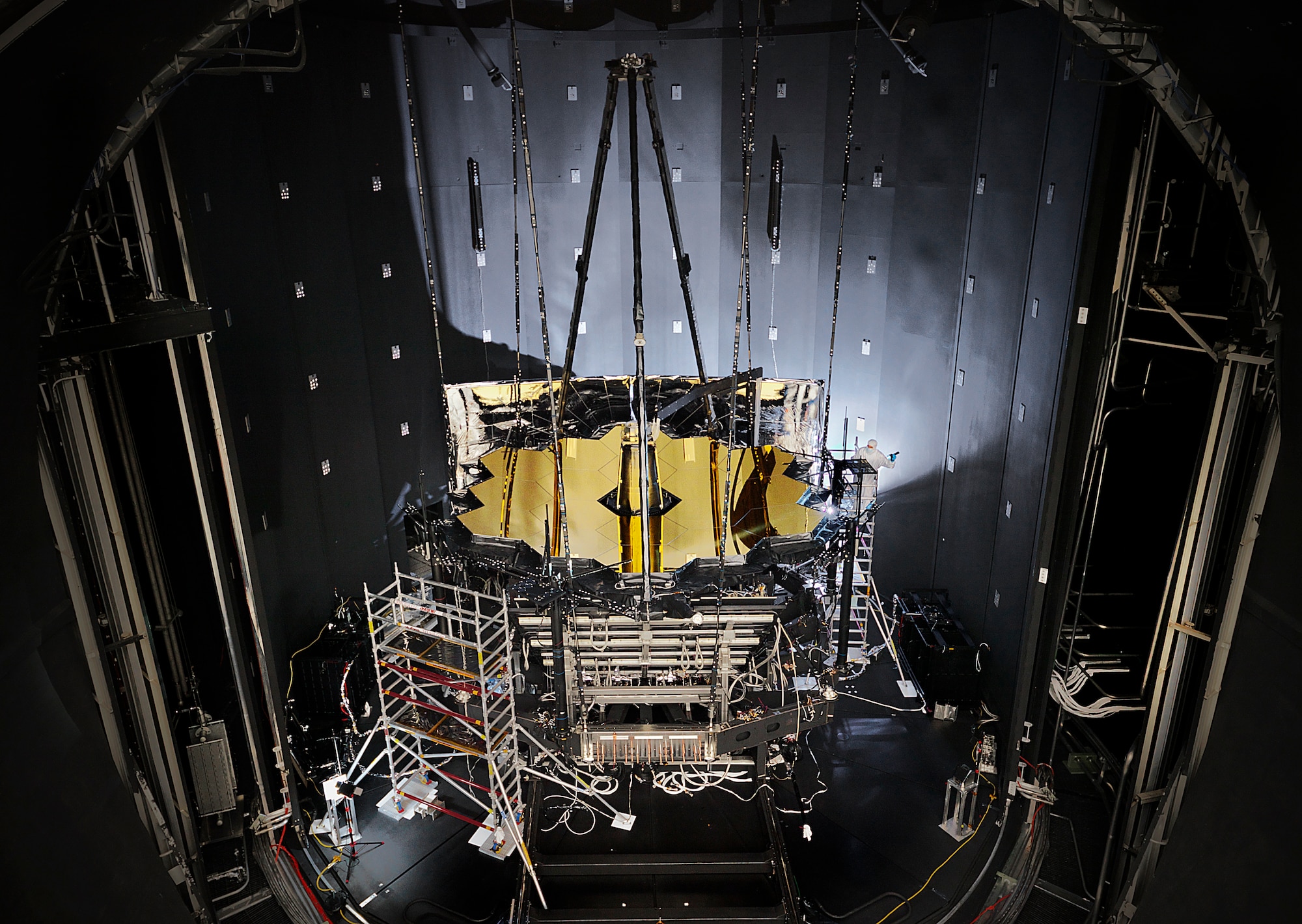 NASA’s James Webb Space Telescope sits inside Chamber A at NASA’s Johnson Space Center in Houston after completing its cryogenic testing Nov. 18, 2017. This marked the telescope’s final cryogenic testing, and it ensured the observatory is ready for the frigid, airless environment of space. The telescope’s shipping container, known as the Space Telescope Transporter for Air, Road and Sea (STTARS), was certified safe for flight by the Air Force Life Cycle Management Center’s Air Transportability Test Loading Activity May 15, 2014. (NASA photo/Chris Gunn)