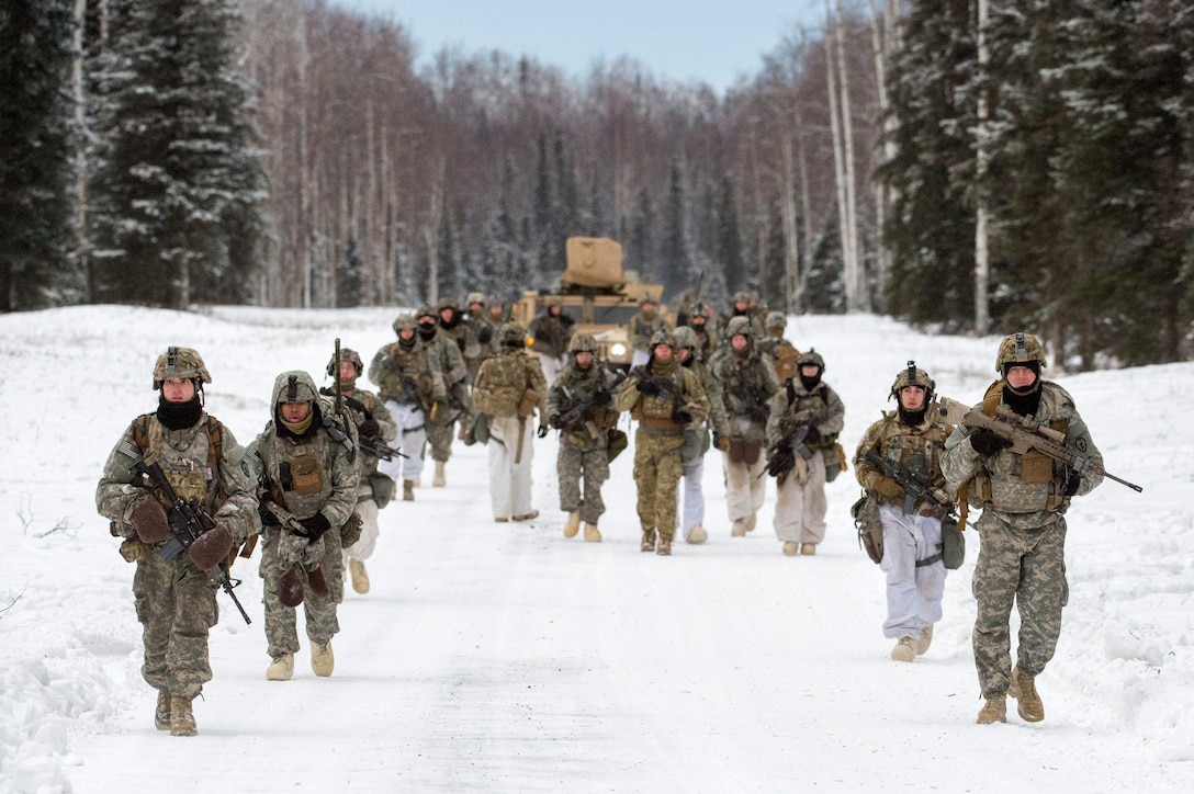 Soldiers from the 25th Infantry Division march during Operation Punchbowl at Joint Base Elmendorf-Richardson, Alaska.