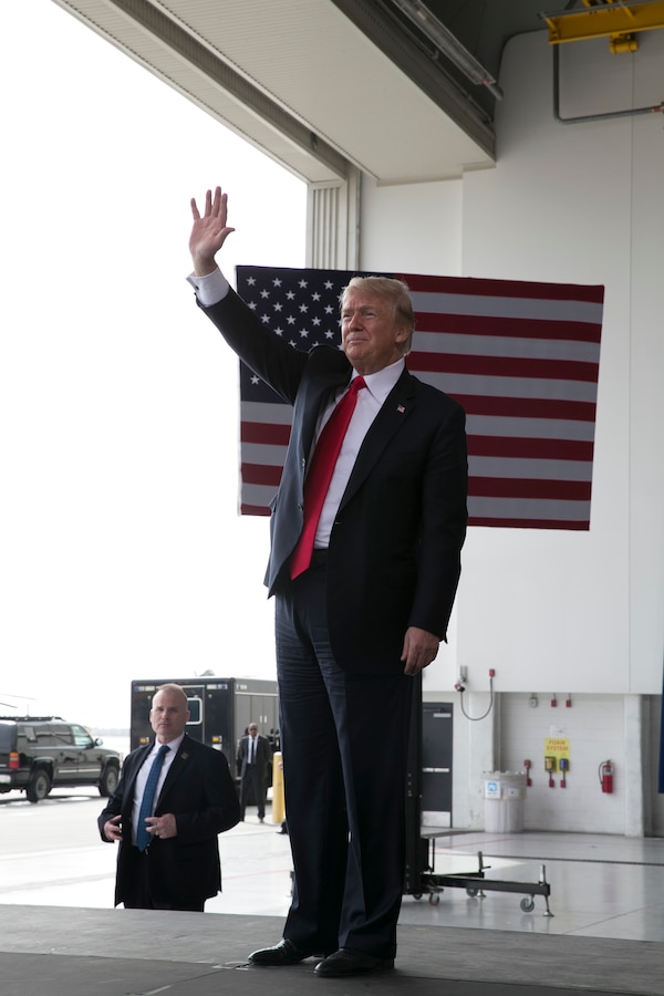 President of the United States Donald J. Trump waves at troops at Marine Corps Air Station Miramar, Calif., March 13. During the president's trip to San Diego, he spoke to service members and guests. (U.S. Marine Corps photo by Sgt. Andrianna Talbot/Released)