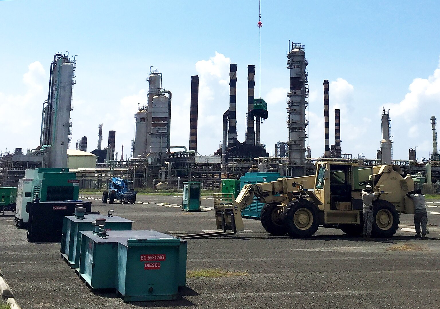Generators provided by DLA Troop Support await airlift by helicopter from Saint Thomas, U.S. Virgin Islands, to Saint Croix, U.S. Virgin Islands. The generators are part of the ongoing efforts to restore power to the islands devastated by Hurricane Maria