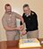 U.S. Navy Lt. Raymond Walston, a physician serving at Naval Health Clinic Charleston, and U.S. Navy Capt. Keith Hanley, NHCC’s chief medical officer, cut the cake during a ceremony celebrating the 147th birthday of the Navy Medical Corps.
