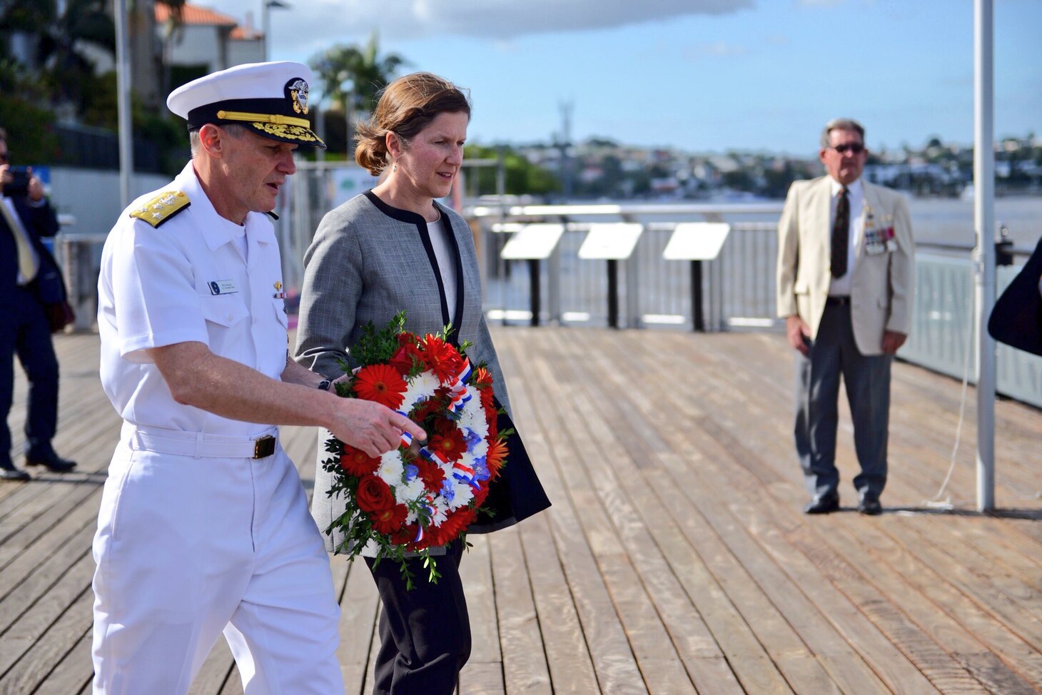 BRISBANE, Australia (March 14, 2018) Vice Adm. Phil Sawyer, commander of U.S. 7th Fleet, and U.S. Consul General Valerie Fowler prepare to lay a wreath at the Submariners Walk Heritage Trail, where the U.S. Navy's Task Force 42/72 was located during World War II. Sawyer is visiting Brisbane in conjunction with the 75th anniversary of 7th Fleet's establishment here on March 15, 1943. (U.S Consulate General Sydney photo)