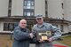 U.S. Air Force Brig. Gen. Richard G. Moore Jr., 86th Airlift Wing commander, right, receives a plaque keys from Dave Nichols of the U.S. Army Corps of Engineers during a ribbon-cutting ceremony on Ramstein Air Base, Germany, March 7, 2017. The building project for dormitory 2411 saw involvement from the 86th CES, Air Force Civil Engineer Center, U.S. Army Corps of Engineers, and Kaiserslautern State Construction Agency. (U.S. Air Force photo by Senior Airman Joshua Magbanua)