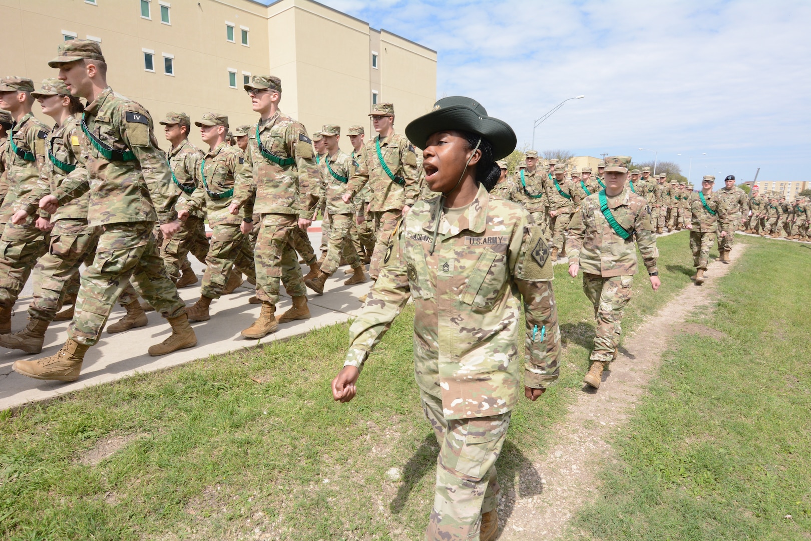 Sgt. 1st Class Magalie Atilus, Delta Company, 232d Medical Battalion, marches with Advanced Individual Training Soldiers at Joint Base San Antonio-Fort Sam Houston, Texas. Atilus recently graduated from the Drill Sergeant Conversion Course at Fort Jackson, SC.