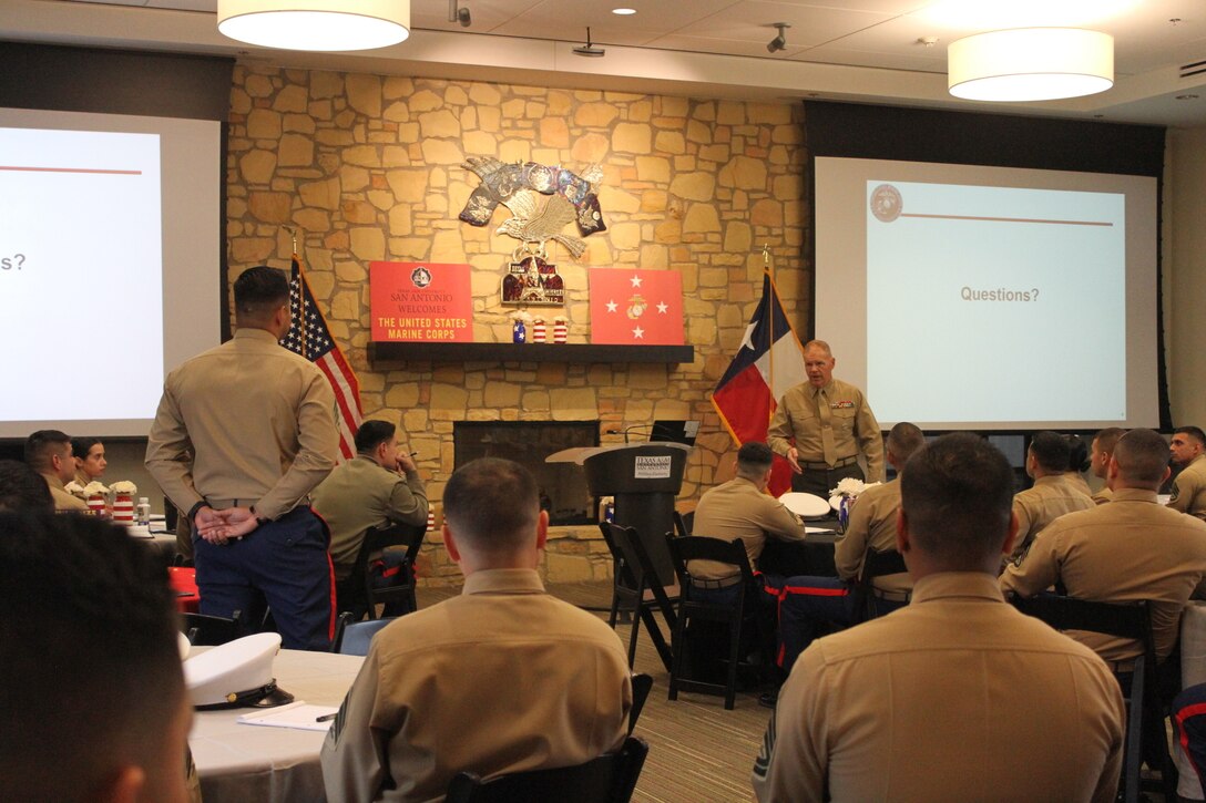 SAN ANTONIO - The Commandant of the Marine Corps, Gen. Robert B. Neller, answers a question from Sgt. Antonio Luna, a Weslaco, Texas native, during a visit to Texas A&M University-San Antonio. Neller addressed recruiters from Recruiting Station San Antonio regarding his latest Message to the Force.